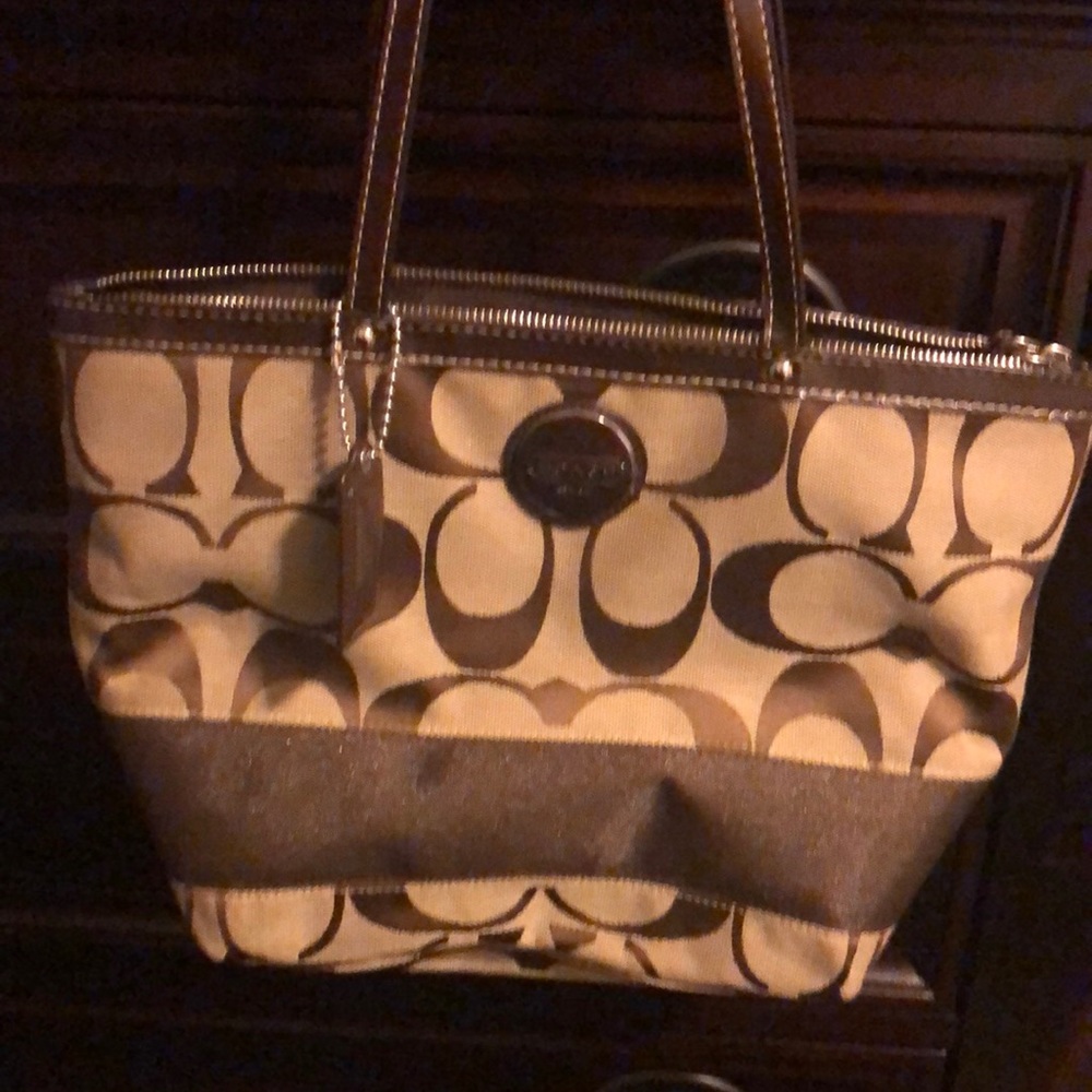 Coach signature bag. W/ leather straps